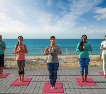 Beach yoga class at a spa in Florida